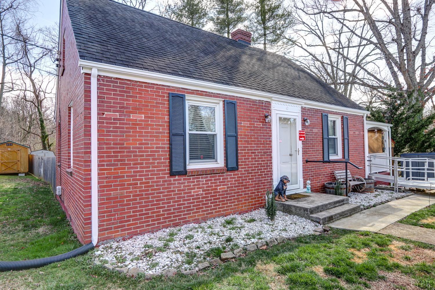 114 Coffee Road Lynchburg, VA 24503 - Photo 23 of 25 a front view of a house with garden