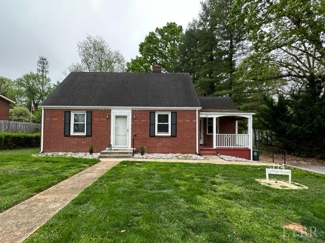 114 Coffee Road Lynchburg, VA 24503 - Photo 25 of 25 a front view of a house with a yard and trees