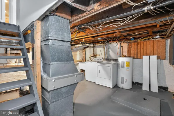 a view of a backyard with large trees