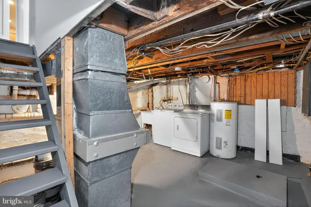 a view of a backyard with large trees