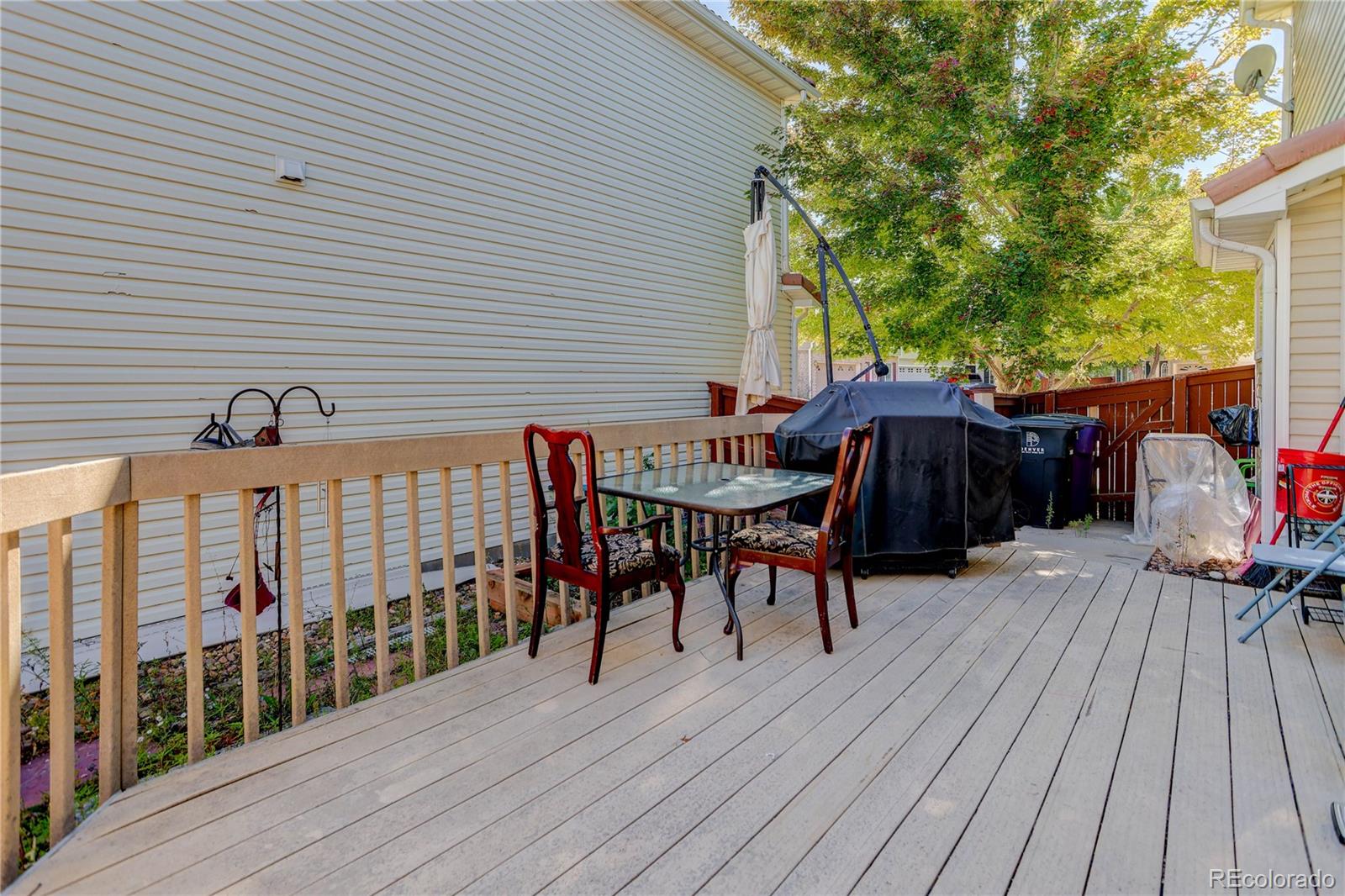 20000 East Mitchell Place, Unit 71 Denver, CO 80249 - Photo 26 of 28 a view of a chairs on deck and patio