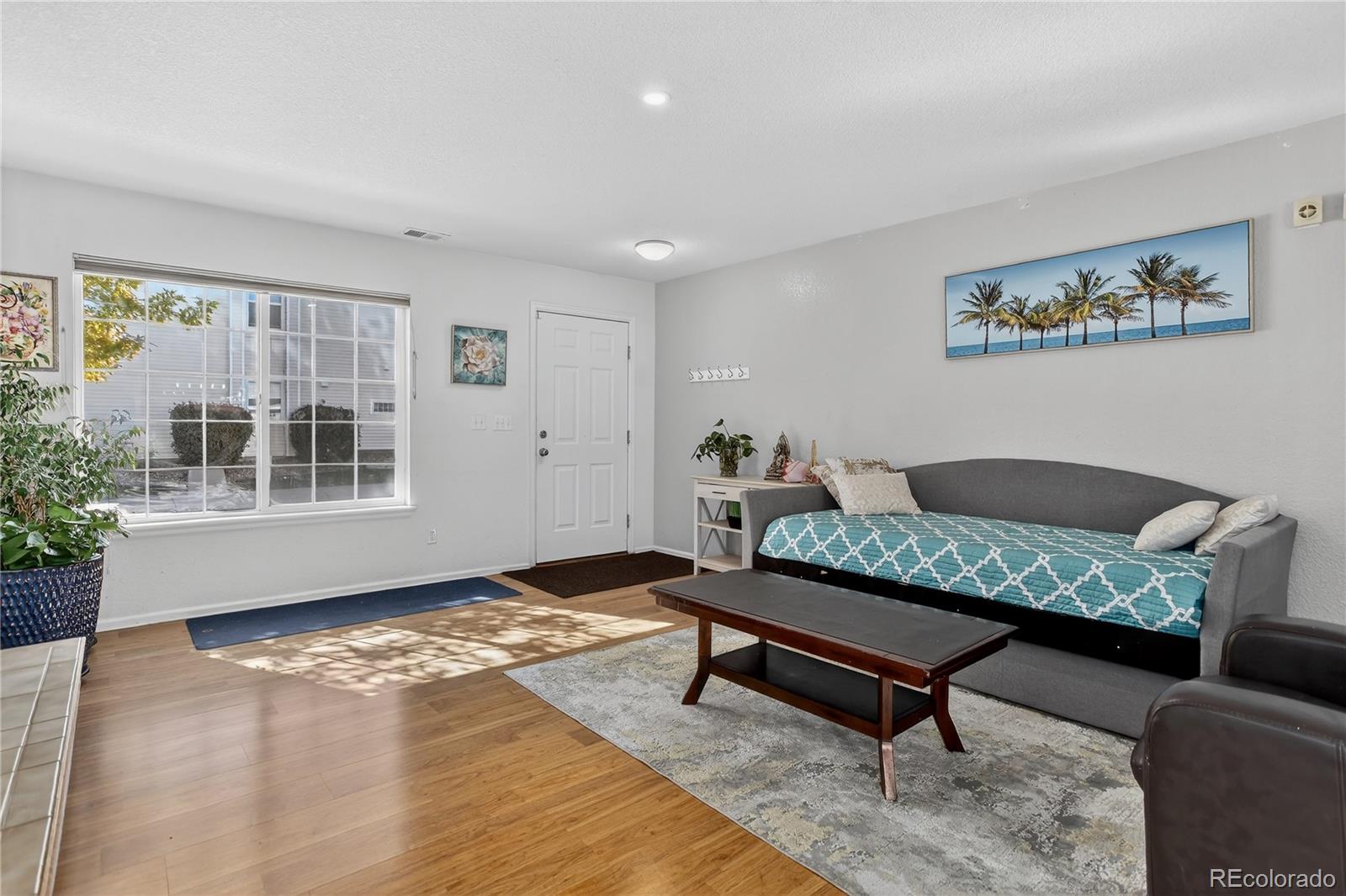 20000 East Mitchell Place, Unit 71 Denver, CO 80249 - Photo 9 of 28 a living room with furniture and a window