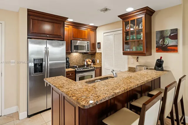 $850,000 | 100 Andalusia Avenue, Unit 408, Coral Gables, FL 33134