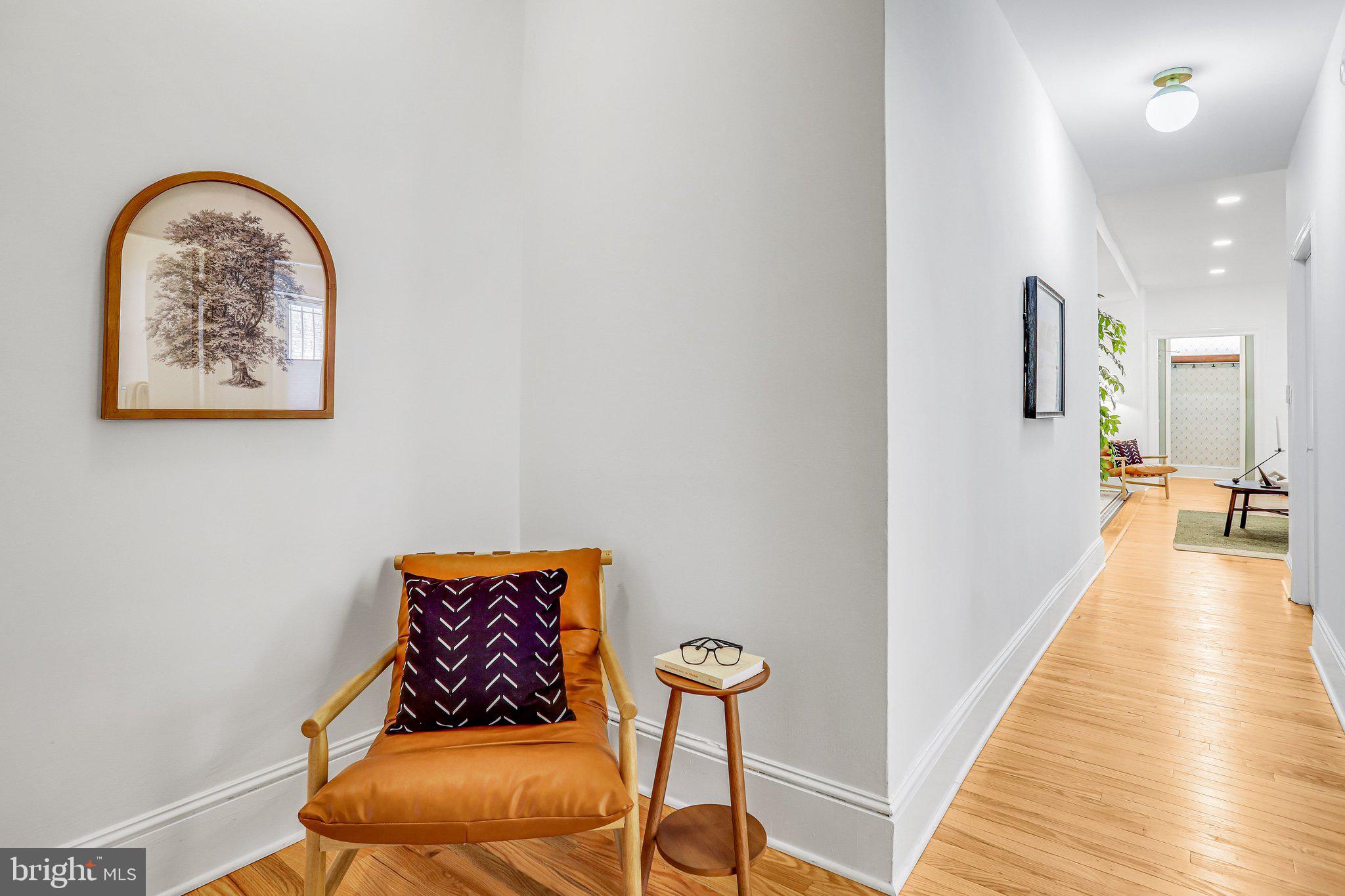 3420 16th Street Northwest, Unit 102 Washington, DC 20010 - Photo 12 of 18 a view of a hallway with seating area