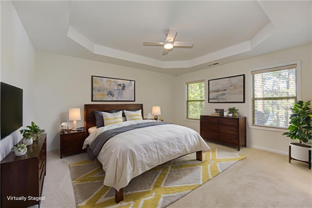 605 Summit Point Canton, GA 30114 - Photo 27 of 56 a bedroom with a bed and a flat screen television