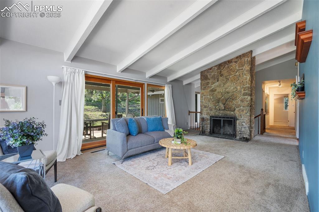 10 Haney Road Colorado Springs, CO 80906 - Photo 18 of 48 a living room with furniture and a fireplace