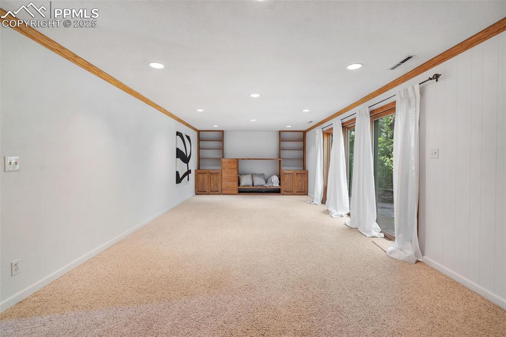 10 Haney Road Colorado Springs, CO 80906 - Photo 36 of 48 a big room with closet and a large window