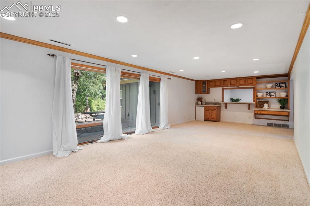 10 Haney Road Colorado Springs, CO 80906 - Photo 37 of 48 a view of empty room with furniture and storage