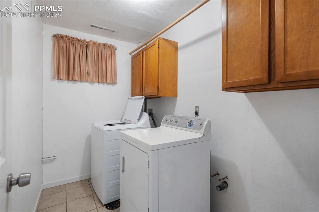 10 Haney Road Colorado Springs, CO 80906 - Photo 40 of 48 a bathroom with a sink and a mirror