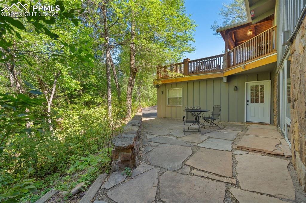 10 Haney Road Colorado Springs, CO 80906 - Photo 41 of 48 a view of backyard with outdoor seating and green space