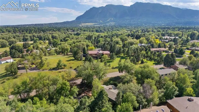an aerial view of residential house and outdoor space