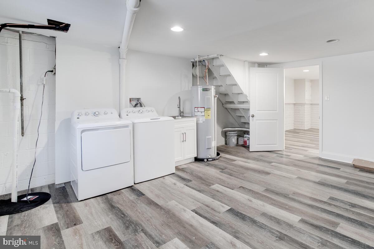 1046 Elm Road Baltimore, MD 21227 - Photo 27 of 29 Laundry Center and Storage Area