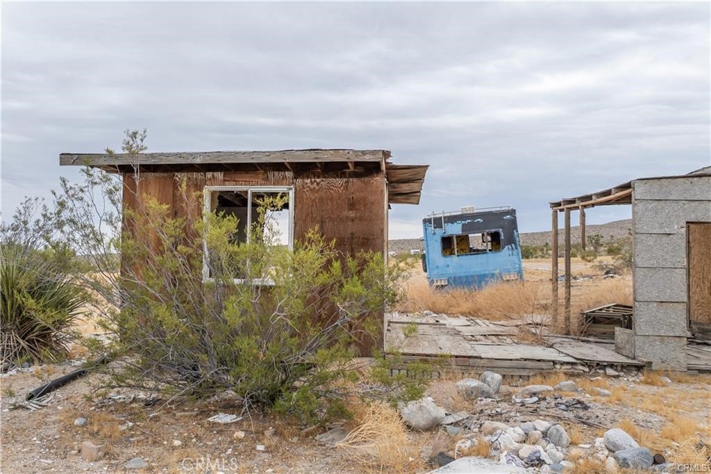 37050 Cheshire Road Lucerne Valley, CA 92356 - Photo 8 of 8 a view of a house with a yard
