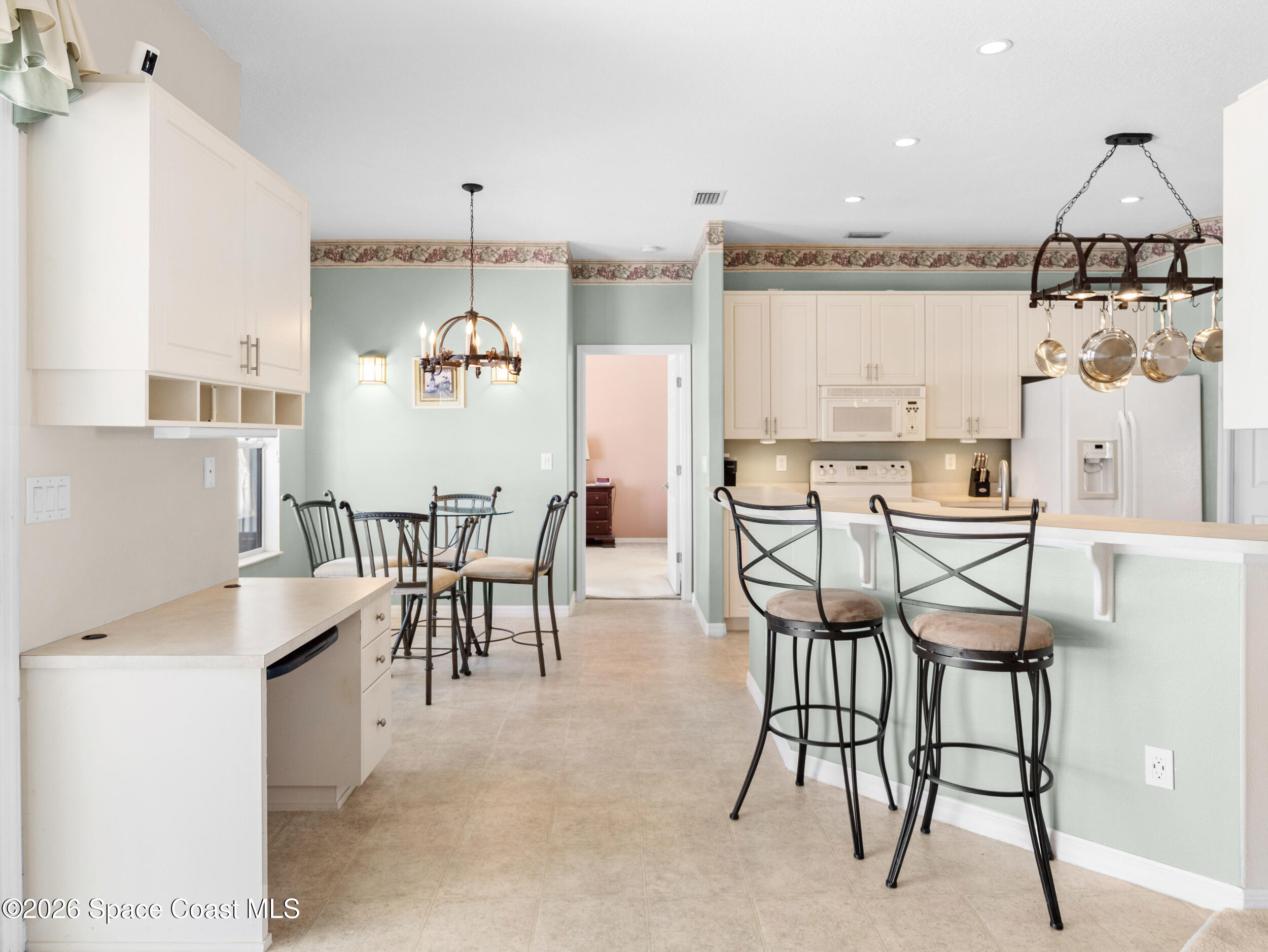 7429 Hackberry Road Cocoa, FL 32927 - Photo 15 of 51 a view of a dining room with furniture window and outside view