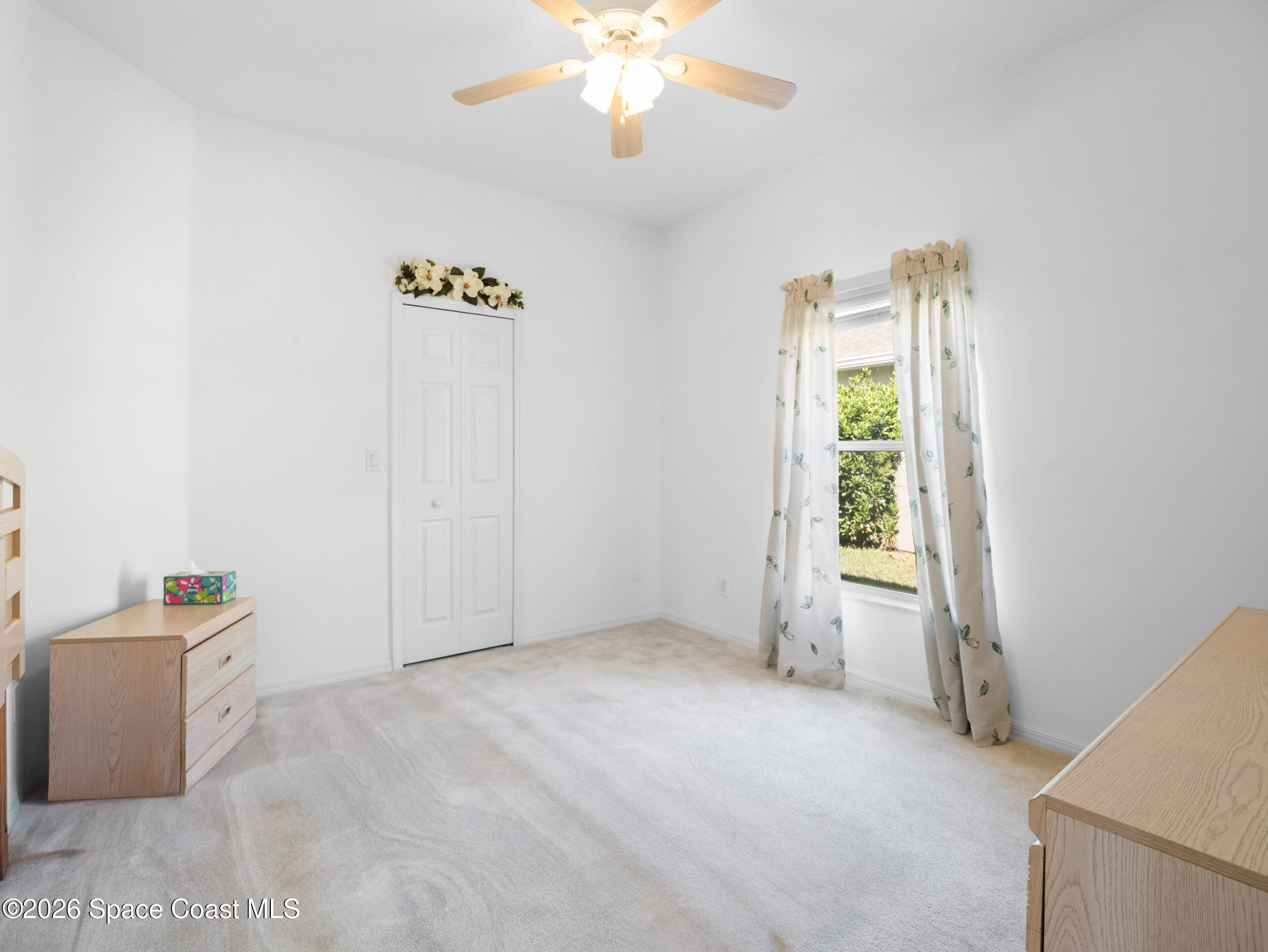 7429 Hackberry Road Cocoa, FL 32927 - Photo 29 of 51 wooden floor in an empty room