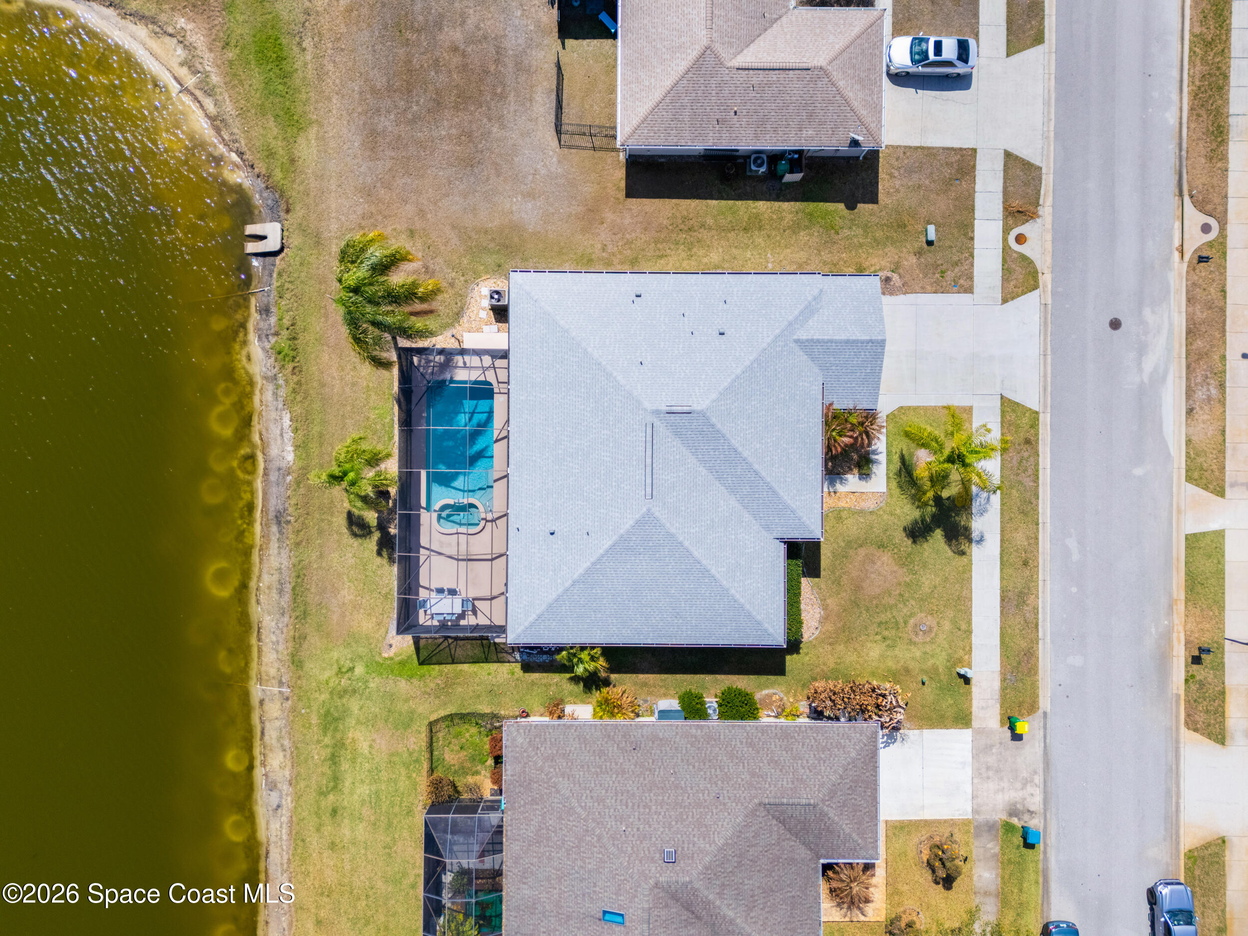 7429 Hackberry Road Cocoa, FL 32927 - Photo 49 of 51 with aerial view of residential house with swimming pool