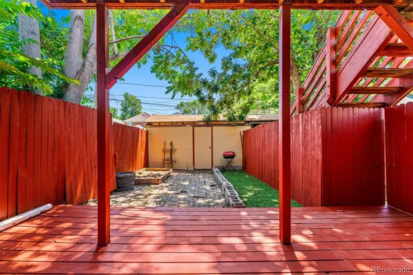 a view of a backyard with a garden