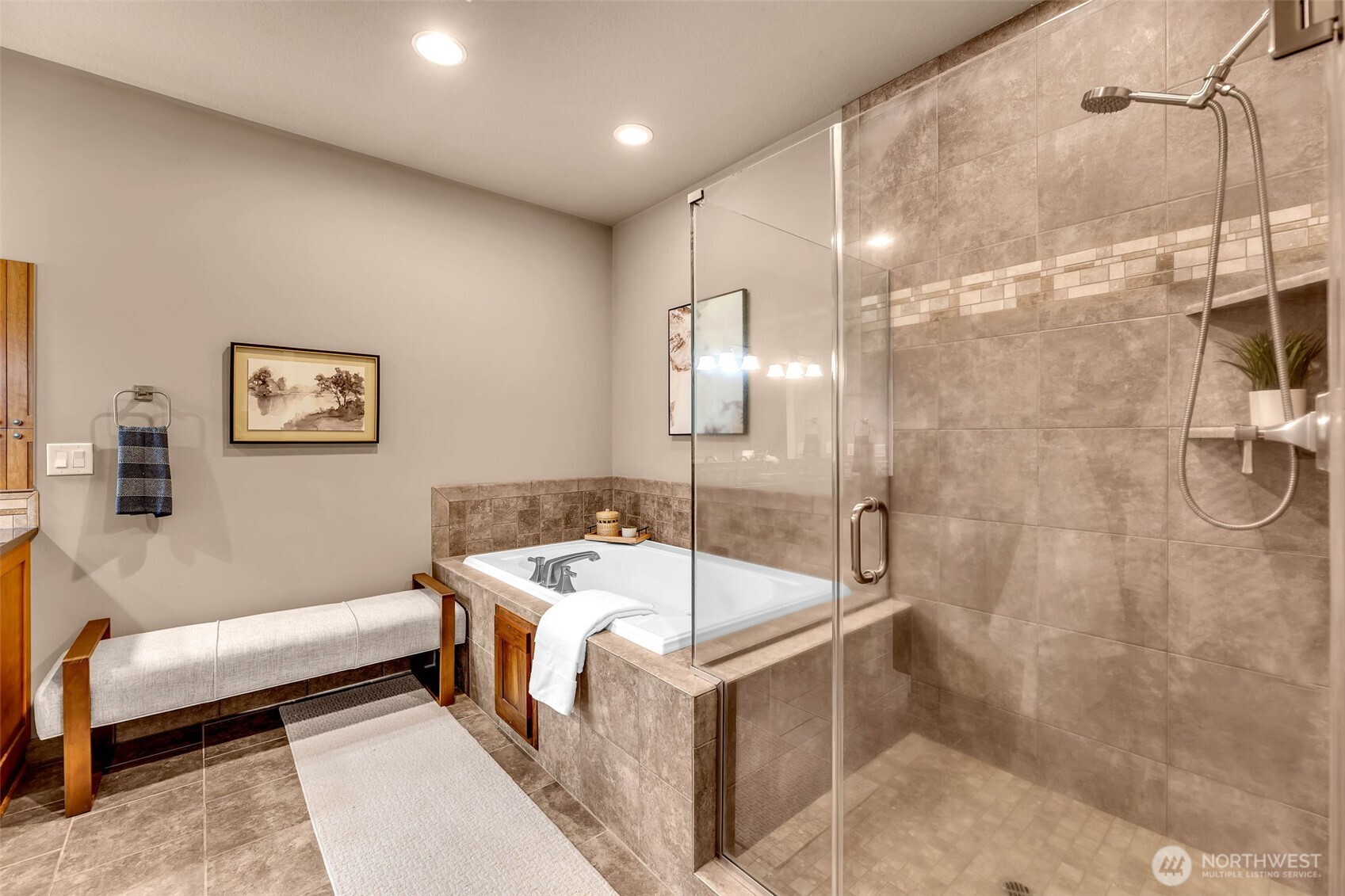 4029 Northwest 77th Avenue Camas, WA 98607 - Photo 19 of 32 a bathroom with a tub a sink and glass door