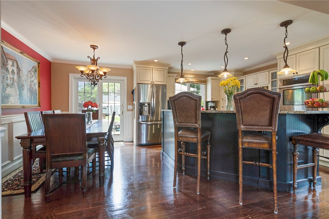 36 Seneca Road Portsmouth, RI 02871 - Photo 11 of 48 Dining area and kitchen with view to the back yard.
