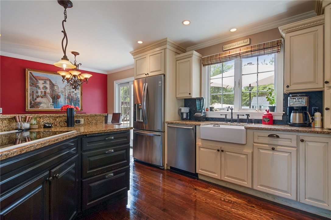 36 Seneca Road Portsmouth, RI 02871 - Photo 14 of 48 Kitchen sink with a large window with views to the backyard.
