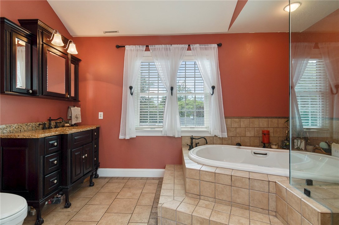 36 Seneca Road Portsmouth, RI 02871 - Photo 29 of 48 Master bathroom with views of the back yard.
