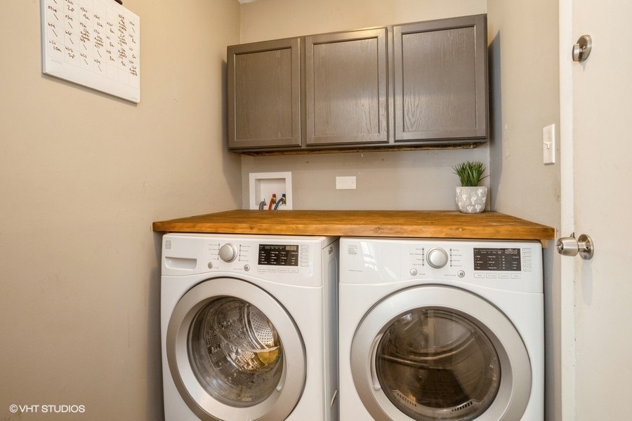 551 Ridge Circle Streamwood, IL 60107 - Photo 13 of 17 a utility room with dryer and washer