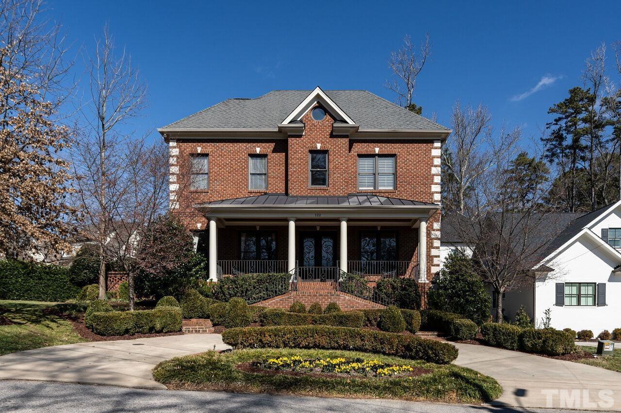 122 Lake Boone Trail Raleigh, NC 27608 - Photo 1 of 46 a front view of a house with a yard