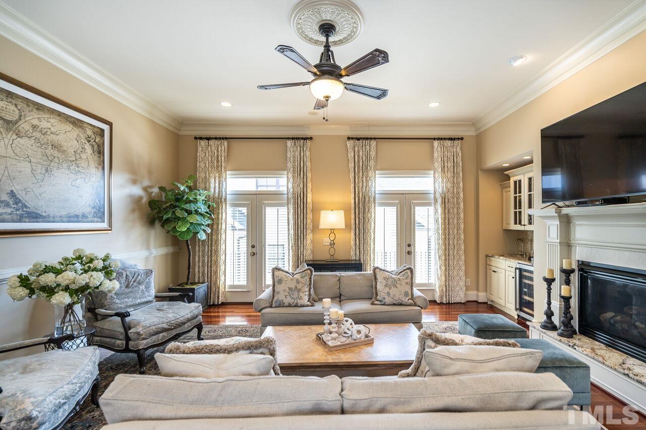 122 Lake Boone Trail Raleigh, NC 27608 - Photo 16 of 46 a living room with fireplace furniture and a large window