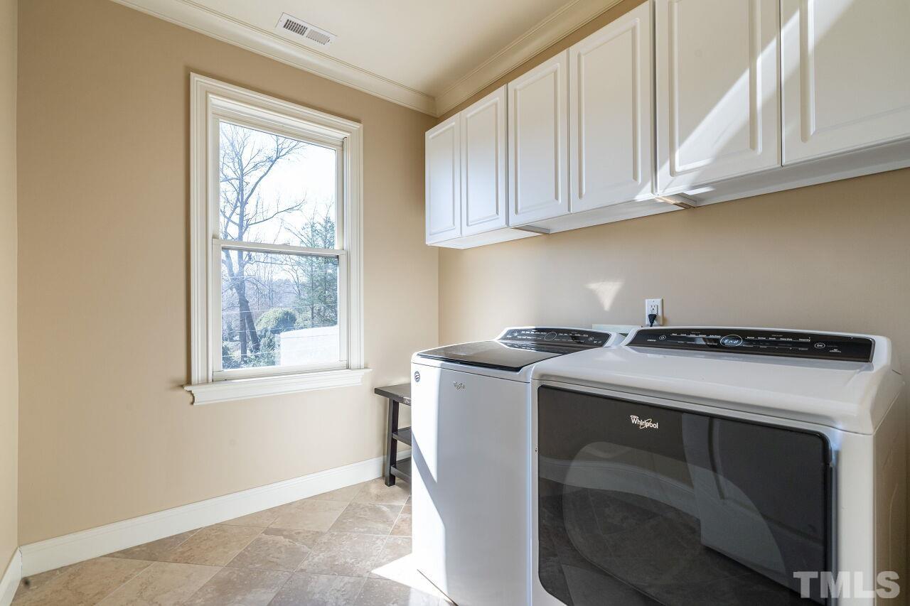 122 Lake Boone Trail Raleigh, NC 27608 - Photo 34 of 46 a utility room with dryer and washer