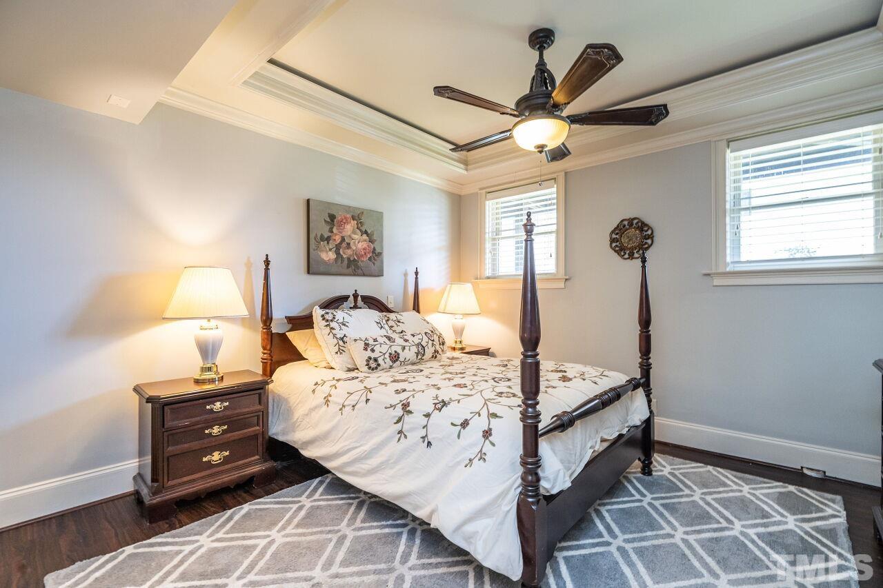 122 Lake Boone Trail Raleigh, NC 27608 - Photo 41 of 46 a bedroom with a bed and a window