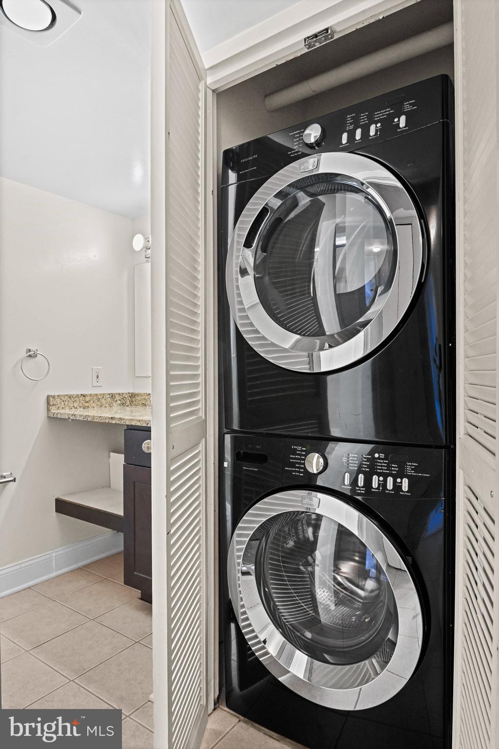 1808 Old Meadow Road, Unit 716 McLean, VA 22102 - Photo 15 of 36 a close view of a washer and dryer