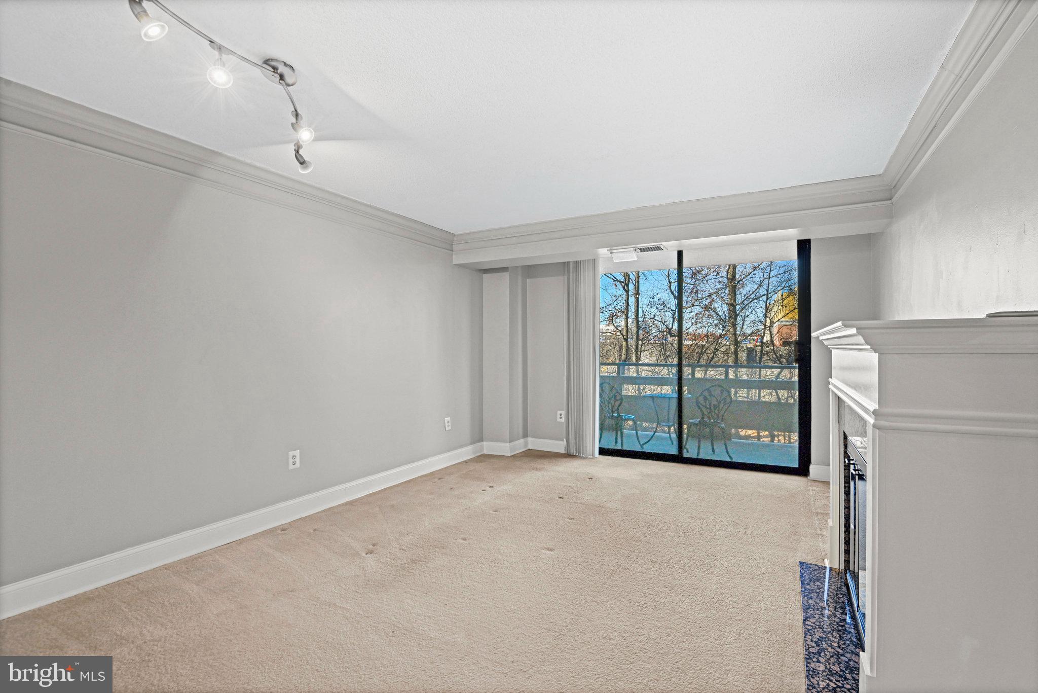 1808 Old Meadow Road, Unit 716 McLean, VA 22102 - Photo 8 of 36 a view of a livingroom with a & refrigerator