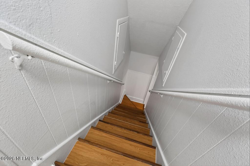 43739 Ratliff Road Callahan, FL 32011 - Photo 44 of 55 a view of staircase with white walls