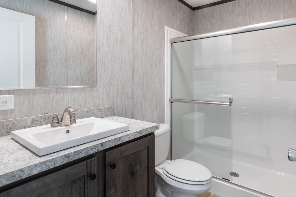 321 Beallsville Road Bentleyville, PA 15314 - Photo 16 of 26 a bathroom with a sink a toilet and shower