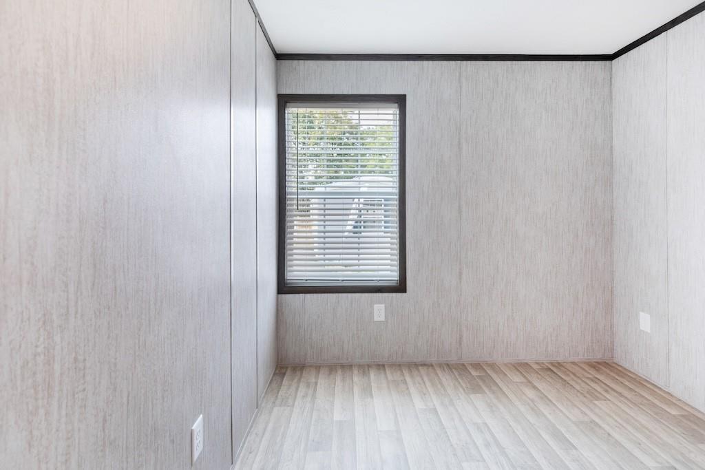 321 Beallsville Road Bentleyville, PA 15314 - Photo 24 of 26 a view of an empty room with a window and hardwood floor