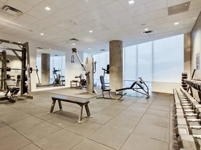 a view of a living room and kitchen