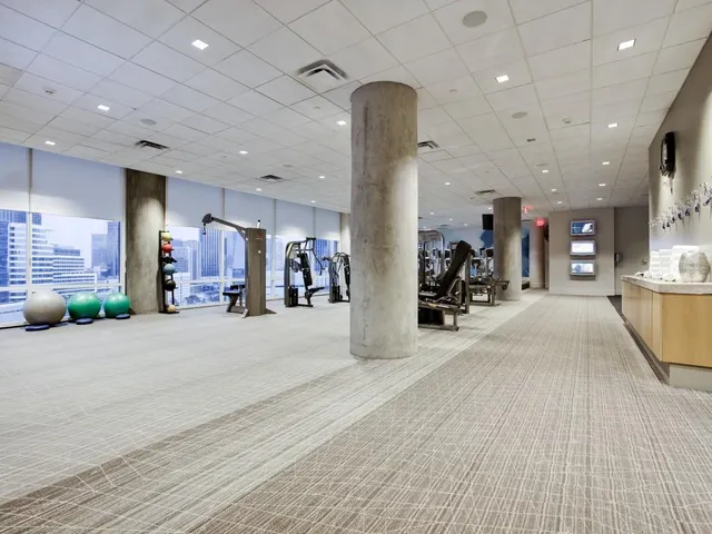 a view of pool with seating area