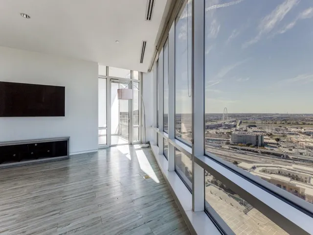 a view of a living room and a flat screen tv