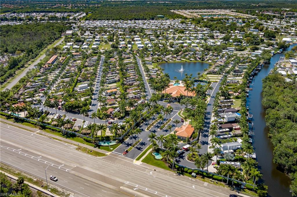13375 Snook Circle Naples, FL 34114 - Photo 22 of 28 an aerial view of residential houses with outdoor space