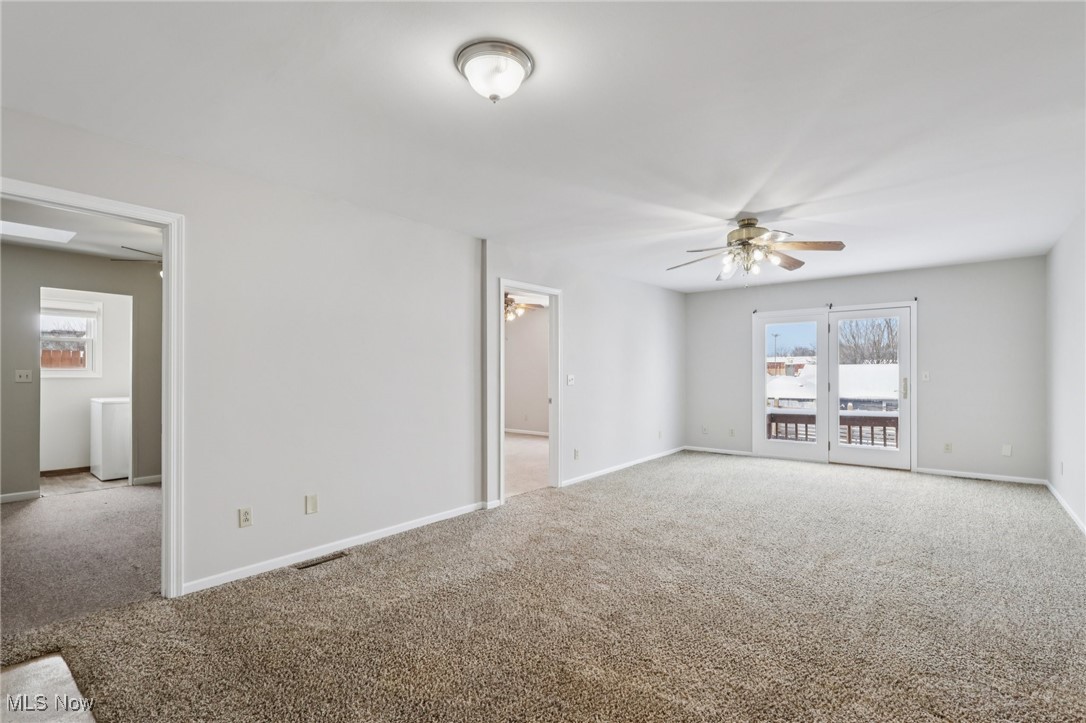 611 Wilson Street Struthers, OH 44471 - Photo 13 of 44 Spare room with carpet floors and a ceiling fan