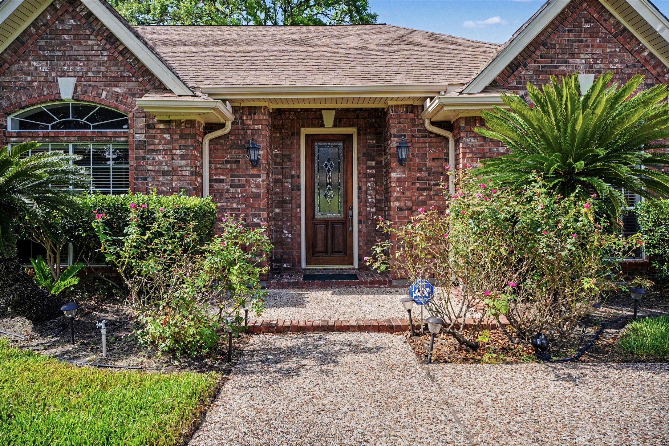 13229 Rene Circle Santa Fe, TX 77510 - Photo 3 of 31 Impressive pea gravel entrance
