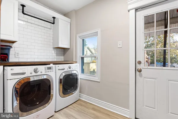 a utility room with dryer and washer