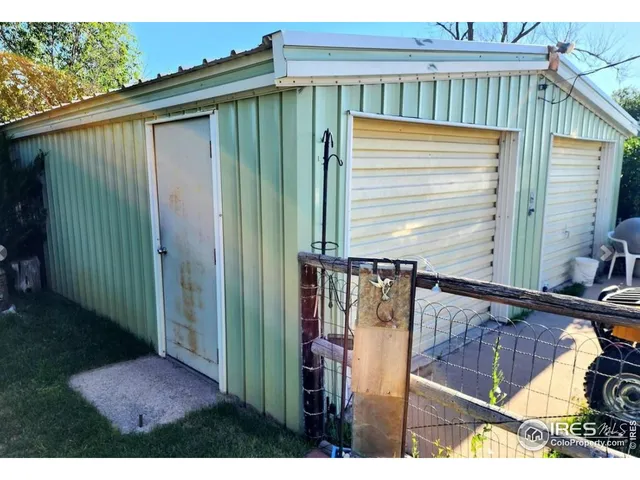 a view of a back yard of the house