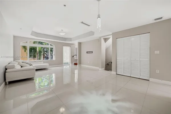a view of livingroom with furniture and window