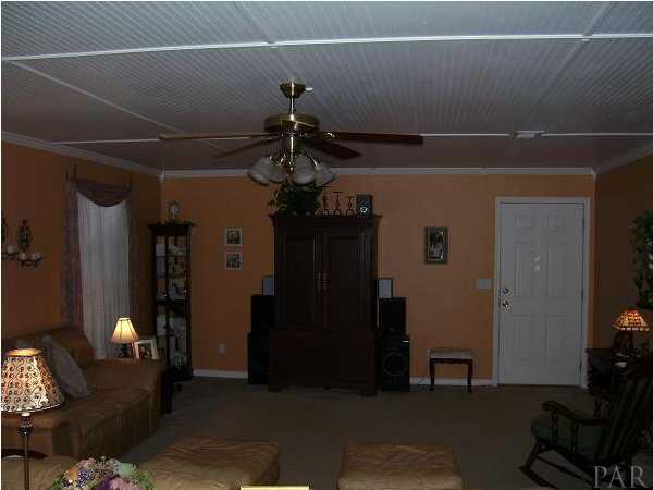 1128 Jacks Branch Road Cantonment, FL 32533 - Photo 6 of 8 Another view of the den with the ceiling waynes coating