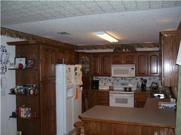 1128 Jacks Branch Road Cantonment, FL 32533 - Photo 8 of 8 another kitchen view