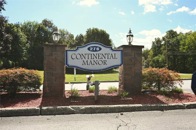 a sign on the side of the road