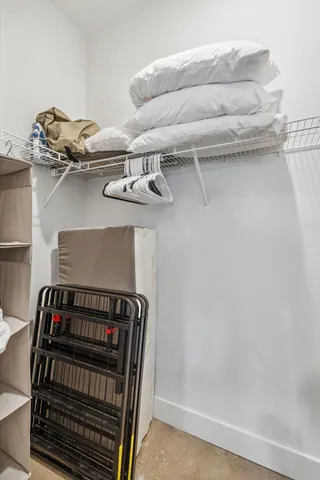 a view of small space with racks on the wall