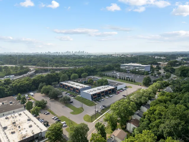 a view of a lake in middle of the town