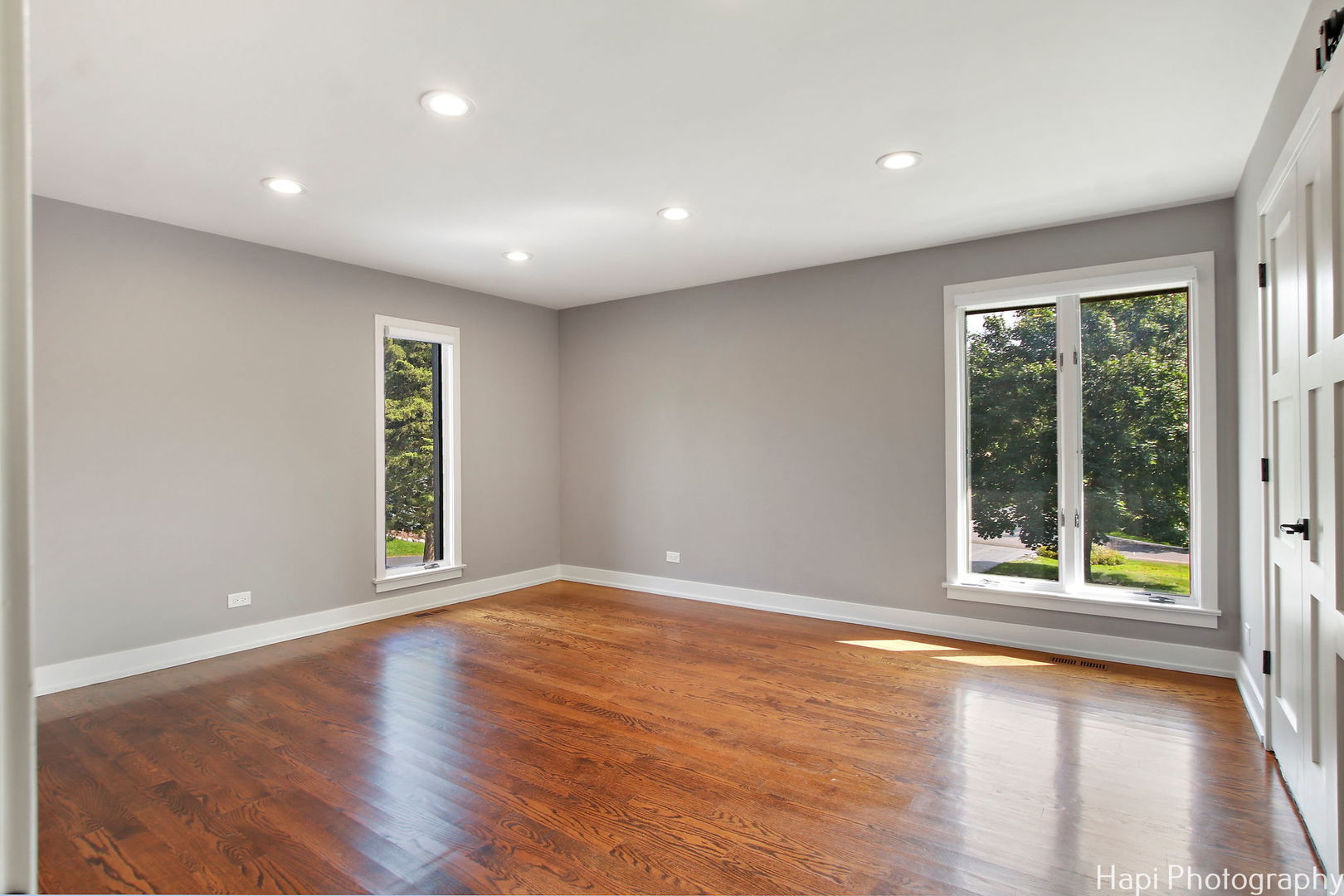 146 Harbor Drive Lake Barrington, IL 60010 - Photo 13 of 33 a view of an empty room with a window and wooden floor